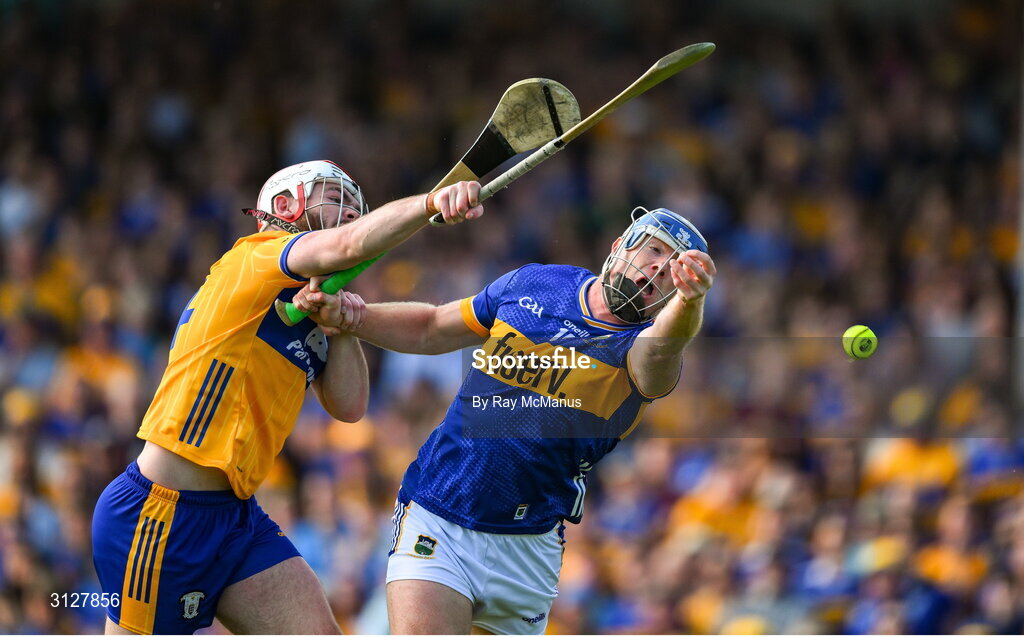 10 May 2025; Jason Forde of Tipperary in action against Conor Lean of Clare during the Munster GAA Hurling Senior Championship Round 3 match between Clare and Tipperary at Zimmer Biomet Páirc Chíosóg in Ennis, Clare. Photo by Ray McManus/Sportsfile