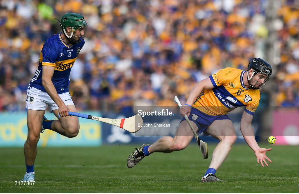 10 May 2025; Tony Kelly of Clare in action against Robert Doyle of Tipperary during the Munster GAA Hurling Senior Championship Round 3 match between Clare and Tipperary at Zimmer Biomet Páirc Chíosóg in Ennis, Clare. Photo by John Sheridan/Sportsfile