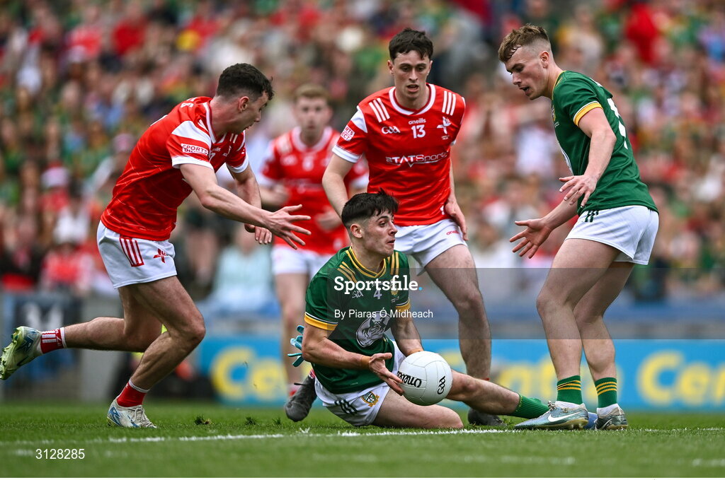 11 May 2025; Brian O'Halloran of Meath, supported by team-mate Ruairí Kinsella, right, in action against Louth players Craig Lennon, left, and Kieran McArdle during the Leinster GAA Football Senior Championship final match between Louth and Meath at Croke Park in Dublin. Photo by Piaras Ó Mídheach/Sportsfile
