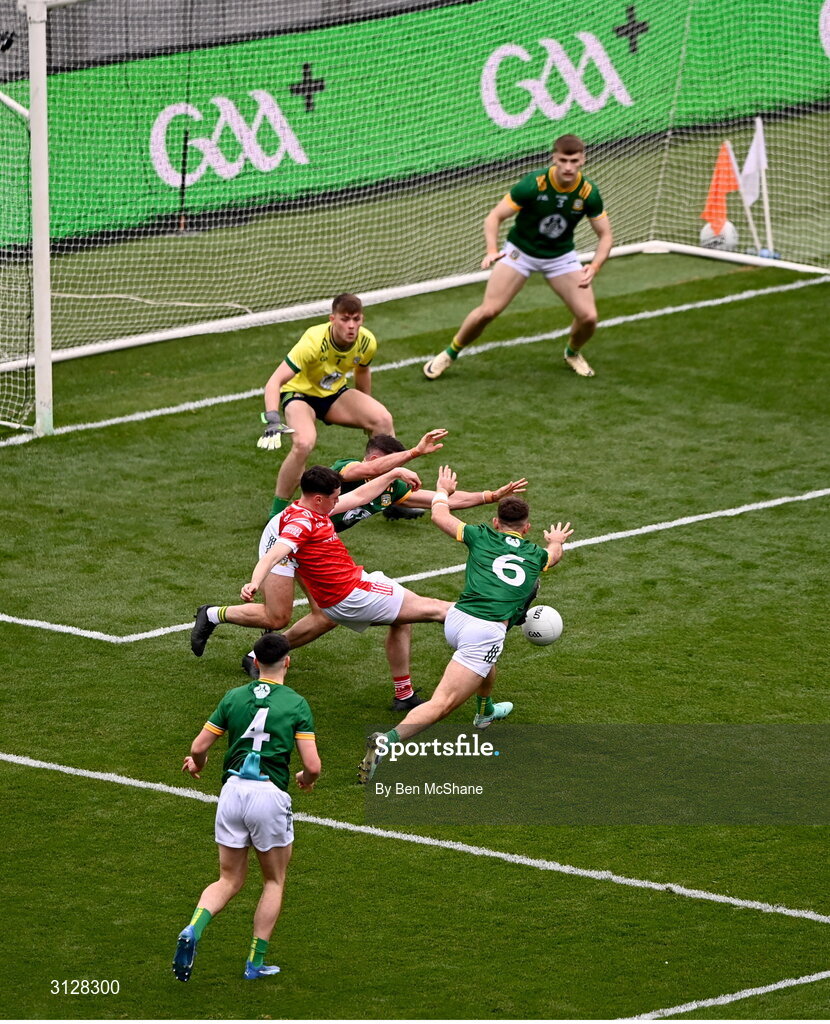 11 May 2025; Kieran McArdle of Louth is fouled by Donal Keogan, left, and Seán Coffey of Meath, leading to a penalty, during the Leinster GAA Football Senior Championship final match between Louth and Meath at Croke Park in Dublin. Photo by Ben McShane/Sportsfile