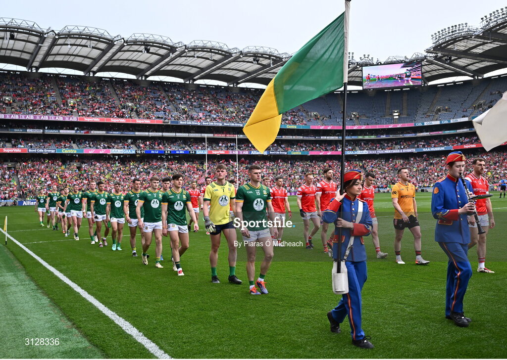 11 May 2025; Meath captain Eoghan Frayne and Louth captain Ciarán Downey lead their teams in the parade behind The Artane Band before the Leinster GAA Football Senior Championship final match between Louth and Meath at Croke Park in Dublin. Photo by Piaras Ó Mídheach/Sportsfile