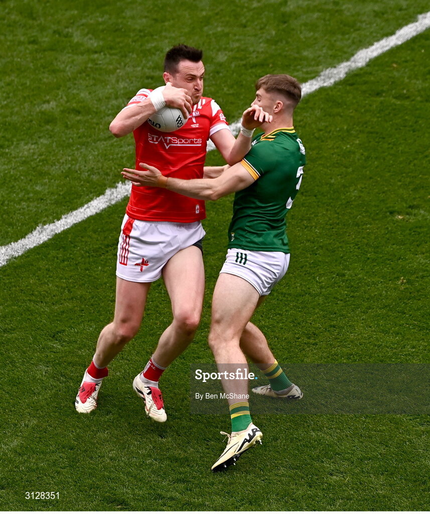 11 May 2025; Tommy Durnin of Louth is tackled by Seán Rafferty of Meath during the Leinster GAA Football Senior Championship final match between Louth and Meath at Croke Park in Dublin. Photo by Ben McShane/Sportsfile