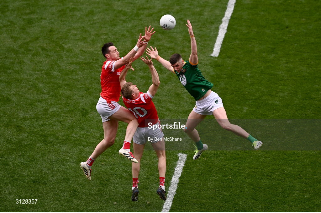 11 May 2025; Tommy Durnin, left, and Paul Matthews of Louth contest a high-ball against Conor Duke of Meath during the Leinster GAA Football Senior Championship final match between Louth and Meath at Croke Park in Dublin. Photo by Ben McShane/Sportsfile