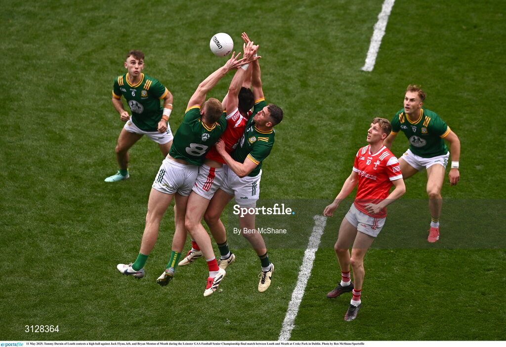 11 May 2025; Tommy Durnin of Louth contests a high-ball against Jack Flynn, left, and Bryan Menton of Meath during the Leinster GAA Football Senior Championship final match between Louth and Meath at Croke Park in Dublin. Photo by Ben McShane/Sportsfile