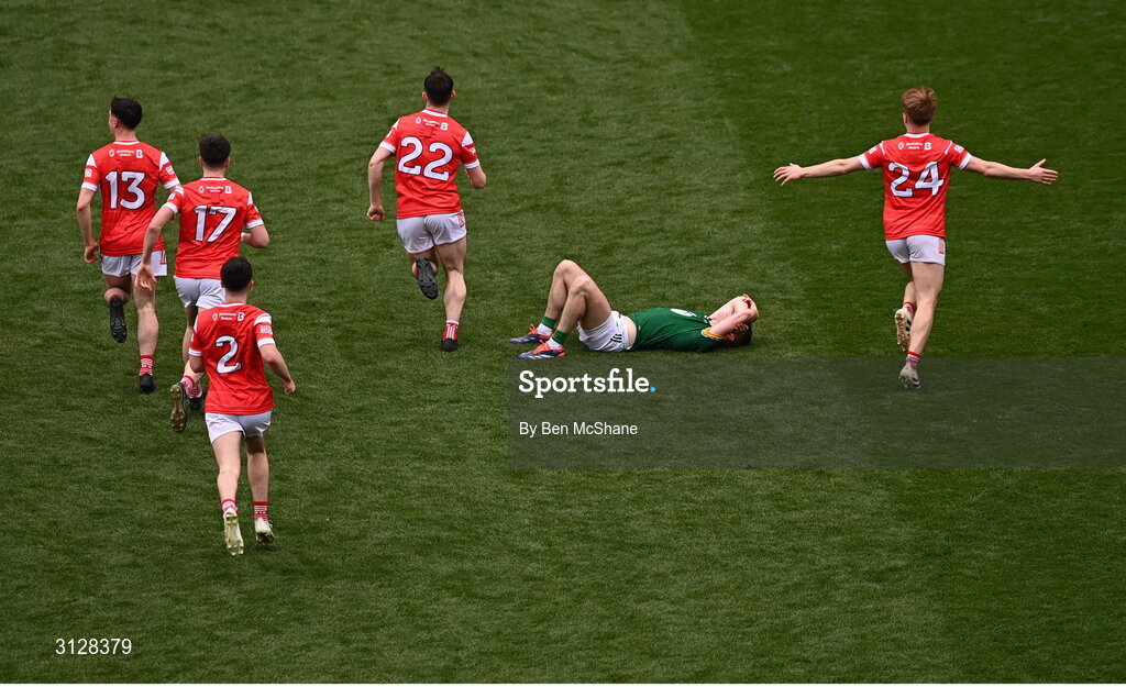 11 May 2025; Eoghan Frayne of Meath lays dejected at the final whistle as Louth players celebrate their victory in the Leinster GAA Football Senior Championship final match between Louth and Meath at Croke Park in Dublin. Photo by Ben McShane/Sportsfile