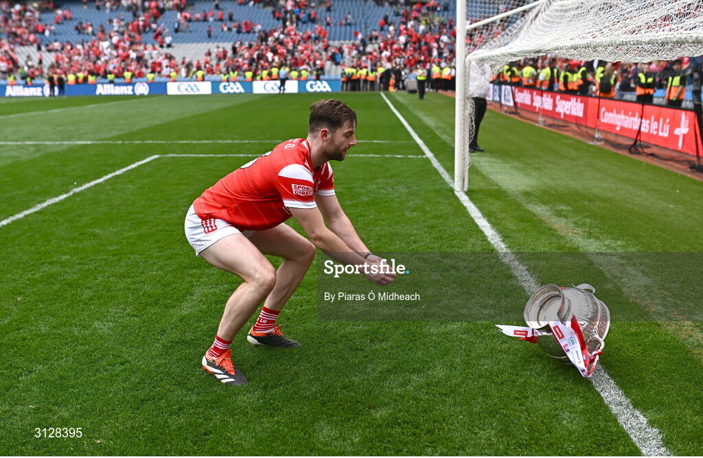 11 May 2025; Dermot Campbell of Louth jovially throws the Delaney Cup over the Canal End goal line after the Leinster GAA Football Senior Championship final match between Louth and Meath at Croke Park in Dublin. Photo by Piaras Ó Mídheach/Sportsfile
