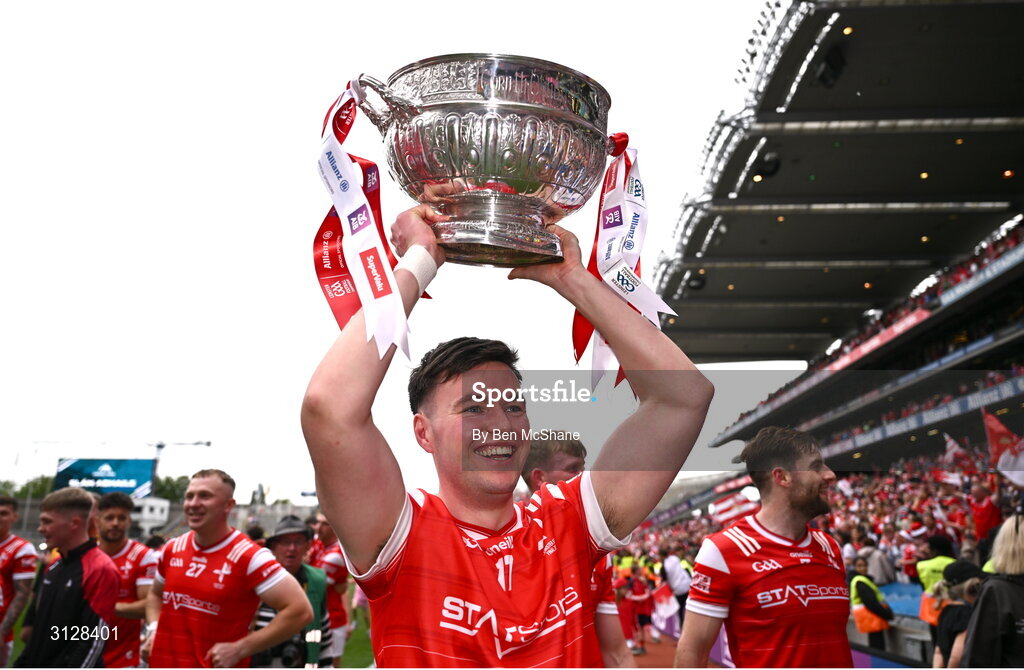 11 May 2025; Liam Jackson of Louth celebrate with the Delaney Cup after the Leinster GAA Football Senior Championship final match between Louth and Meath at Croke Park in Dublin. Photo by Ben McShane/Sportsfile