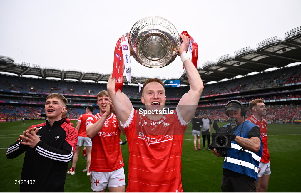 11 May 2025; Donal McKenny of Louth celebrates with the Delaney Cup after the Leinster GAA Football Senior Championship final match between Louth and Meath at Croke Park in Dublin. Photo by Ben McShane/Sportsfile