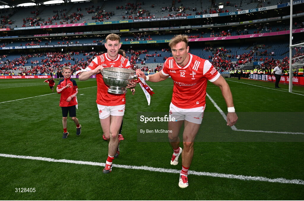 11 May 2025; Peter Lynch, left, and Conor Grimes of Louth celebrate with the Delaney Cup after the Leinster GAA Football Senior Championship final match between Louth and Meath at Croke Park in Dublin. Photo by Ben McShane/Sportsfile