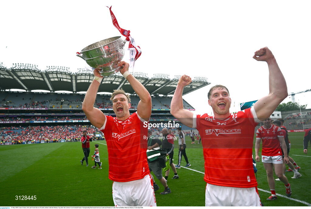 11 May 2025; Conor Grimes, left, and Ciarán Byrne of Louth celebate with the Delaney Cup after the Leinster GAA Football Senior Championship final match between Louth and Meath at Croke Park in Dublin. Photo by Ramsey Cardy/Sportsfile