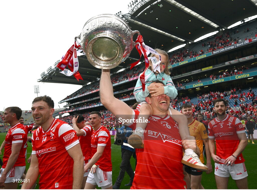 11 May 2025; Bevan Duffy of Louth with his daughter Lydia, age 5, after the Leinster GAA Football Senior Championship final match between Louth and Meath at Croke Park in Dublin. Photo by Ramsey Cardy/Sportsfile