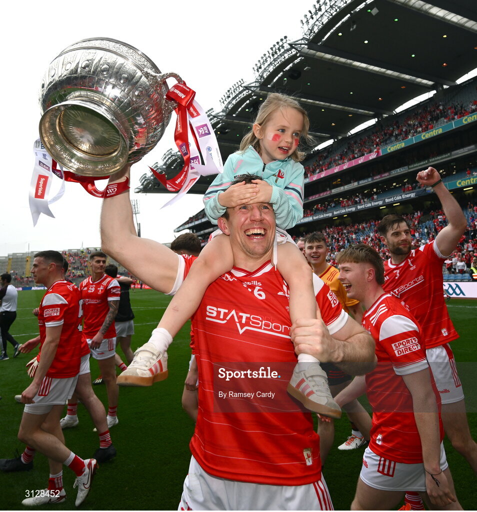 11 May 2025; Bevan Duffy of Louth with his daughter Lydia, age 5, after the Leinster GAA Football Senior Championship final match between Louth and Meath at Croke Park in Dublin. Photo by Ramsey Cardy/Sportsfile