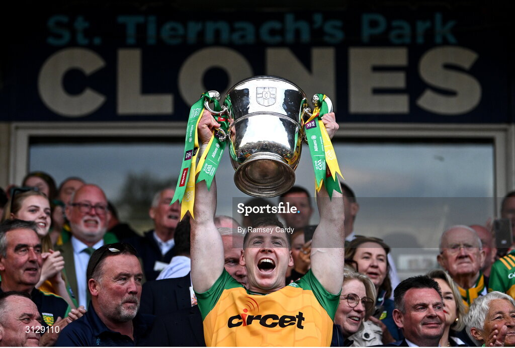 10 May 2025; Jamie Brennan of Donegal lifts the Anglo-Celt Cup after the Ulster GAA Football Senior Championship final match between Armagh and Donegal at St Tiernach's Park in Clones, Monaghan. Photo by Ramsey Cardy/Sportsfile