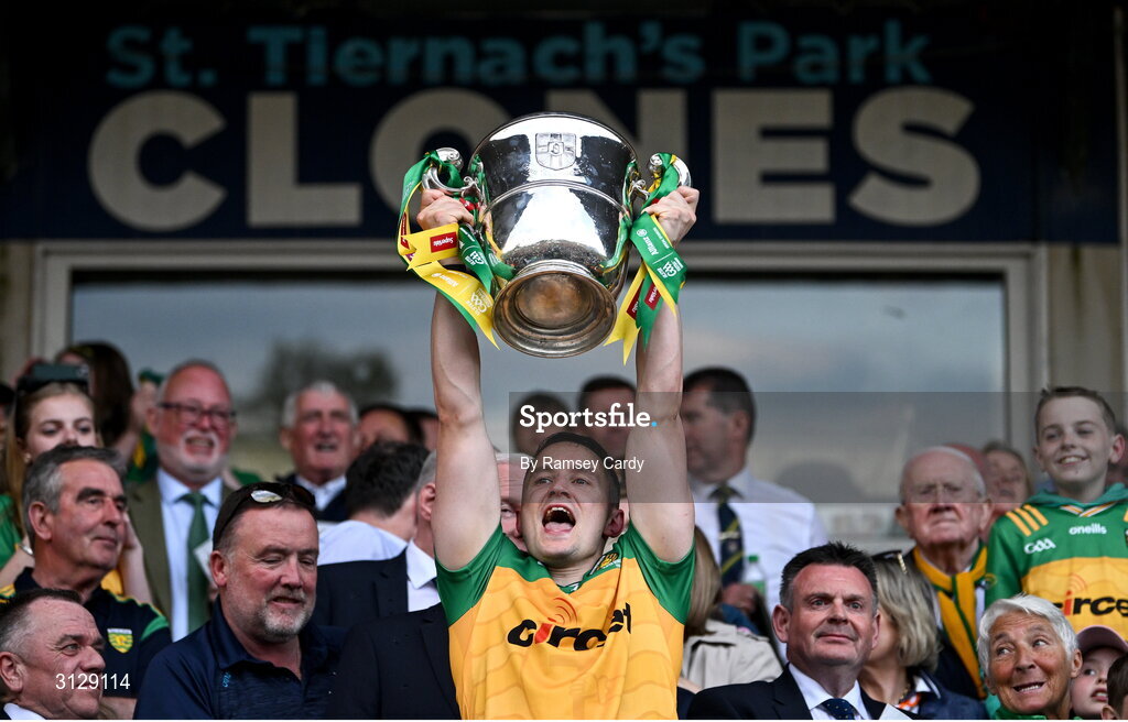 10 May 2025; Eoin McHugh of Donegal lifts the Anglo-Celt Cup after the Ulster GAA Football Senior Championship final match between Armagh and Donegal at St Tiernach's Park in Clones, Monaghan. Photo by Ramsey Cardy/Sportsfile