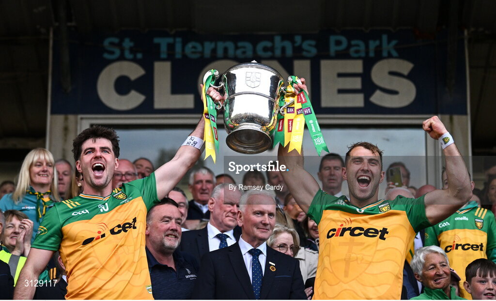 10 May 2025; Dáire Ó Baoill, left, and Stephen McMenamin of Donegal lift the Anglo-Celt Cup after the Ulster GAA Football Senior Championship final match between Armagh and Donegal at St Tiernach's Park in Clones, Monaghan. Photo by Ramsey Cardy/Sportsfile