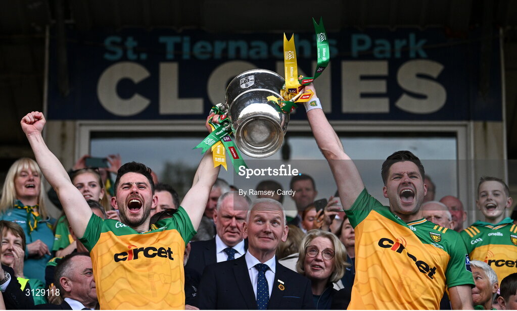 10 May 2025; Ryan McHugh, left, and Brendan McCole of Donegal lift the Anglo-Celt Cup after the Ulster GAA Football Senior Championship final match between Armagh and Donegal at St Tiernach's Park in Clones, Monaghan. Photo by Ramsey Cardy/Sportsfile