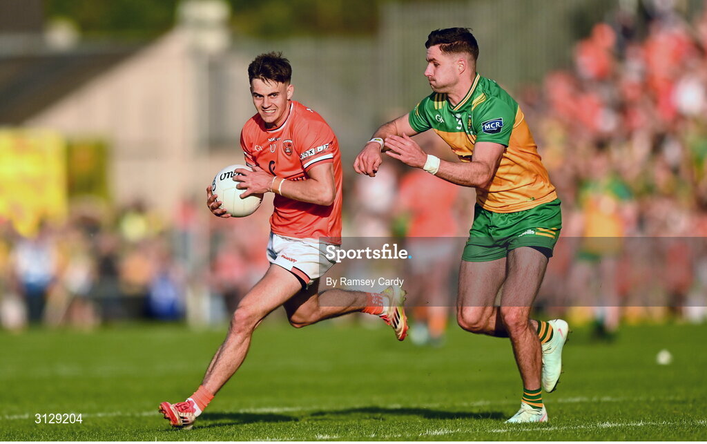 10 May 2025; Darragh McMullan of Armagh in action against Brendan McCole of Donegal during the Ulster GAA Football Senior Championship final match between Armagh and Donegal at St Tiernach's Park in Clones, Monaghan. Photo by Ramsey Cardy/Sportsfile