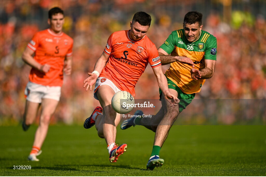 10 May 2025; Oisin Conaty of Armagh in action against Caolan McGonigle of Donegal during the Ulster GAA Football Senior Championship final match between Armagh and Donegal at St Tiernach's Park in Clones, Monaghan. Photo by Ramsey Cardy/Sportsfile
