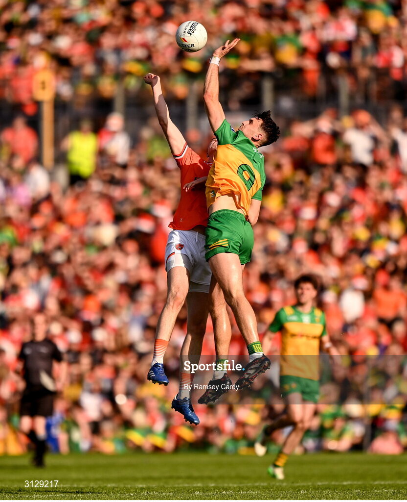 10 May 2025; Michael Langan of Donegal in action against Ben Crealey of Armagh during the Ulster GAA Football Senior Championship final match between Armagh and Donegal at St Tiernach's Park in Clones, Monaghan. Photo by Ramsey Cardy/Sportsfile