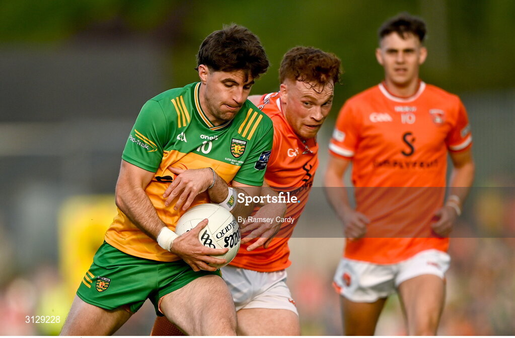 10 May 2025; Dáire Ó Baoill of Donegal in action against Jason Duffy of Armagh during the Ulster GAA Football Senior Championship final match between Armagh and Donegal at St Tiernach's Park in Clones, Monaghan. Photo by Ramsey Cardy/Sportsfile