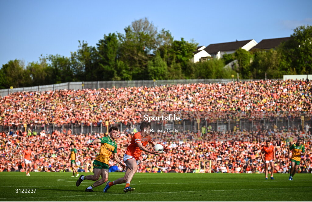 10 May 2025; Andrew Murnin of Armagh in action against Shane O'Donnell of Donegal during the Ulster GAA Football Senior Championship final match between Armagh and Donegal at St Tiernach's Park in Clones, Monaghan. Photo by Ramsey Cardy/Sportsfile