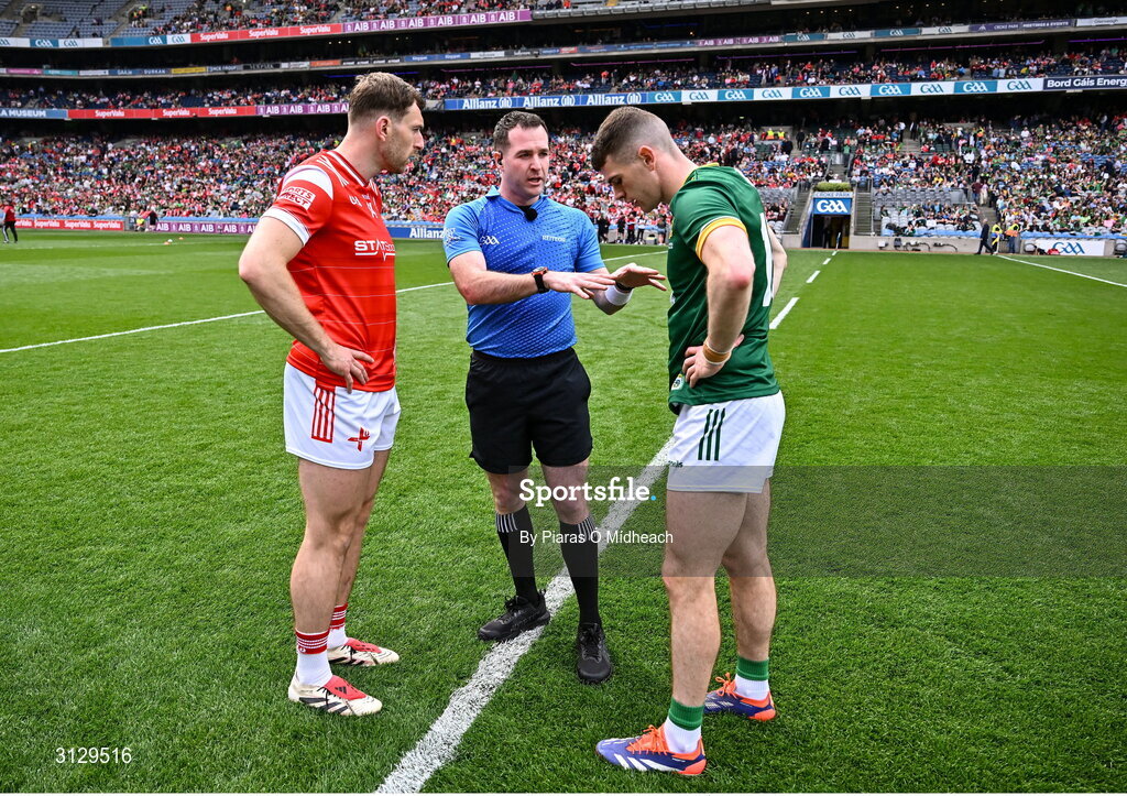 11 May 2025; Referee Martin McNally with team captains Sam Mulroy of Louth and Eoghan Frayne of Meath before the Leinster GAA Football Senior Championship final match between Louth and Meath at Croke Park in Dublin. Photo by Piaras Ó Mídheach/Sportsfile
