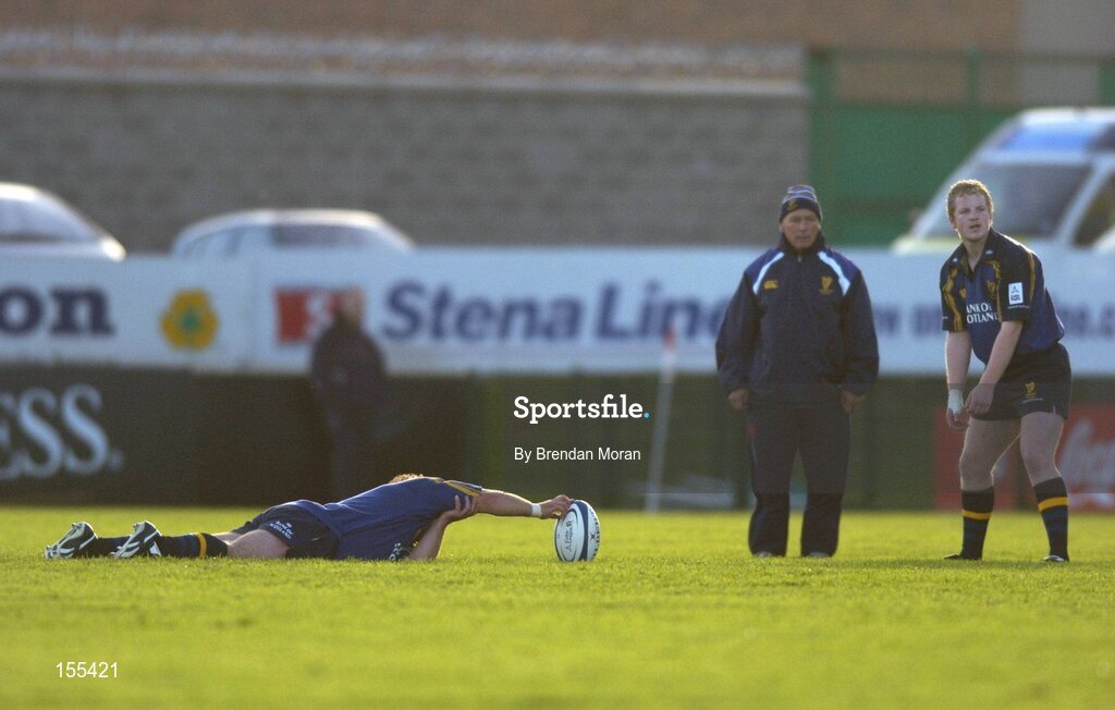 11 September 2004; Leinster's David McAllister prepares to kick a penalty as team-mate Gavin Hickie holds the ball steady. Celtic League 2004-2005, Ulster v Leinster, Ravenhill Park, Belfast. Picture credit; Brendan Moran / SPORTSFILE
