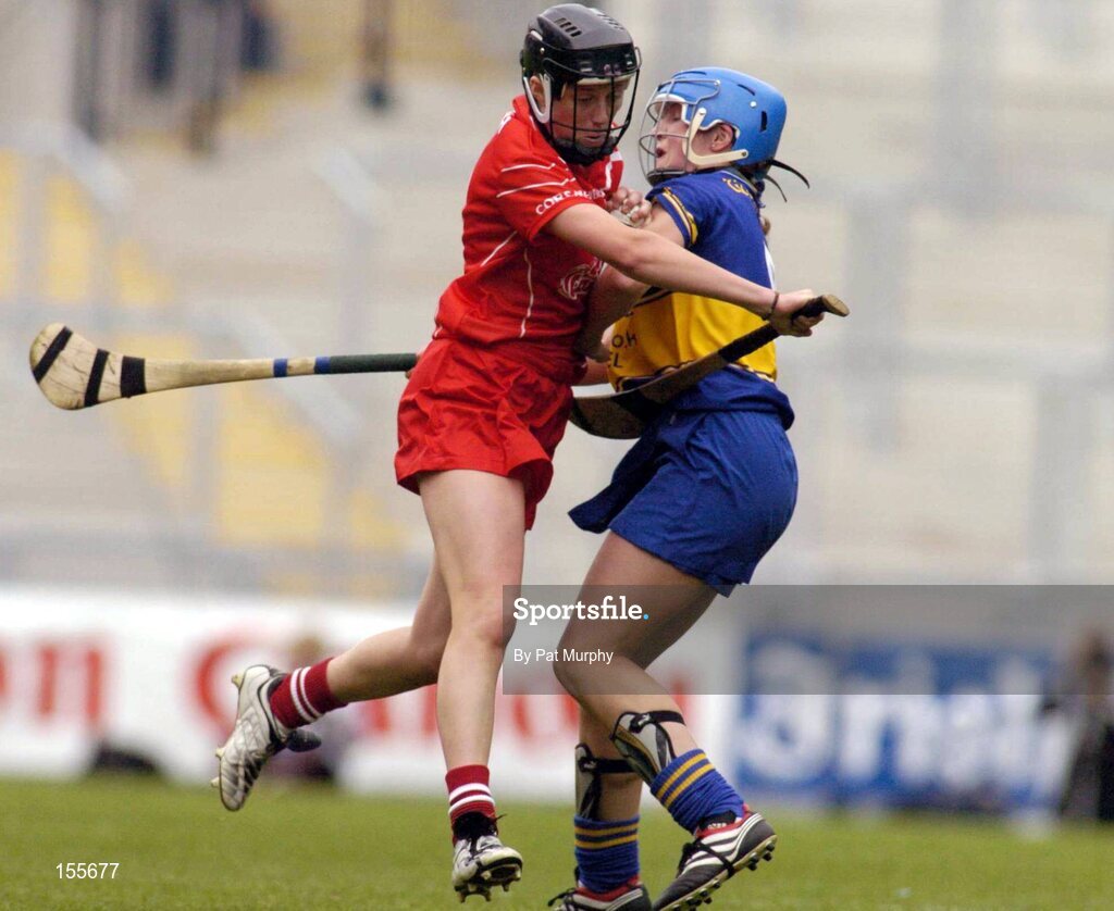 19 September 2004; Gemma O'Connor, Cork, in action against Angie McDermott, Tipperary. Foras na Gaeilge Senior Camogie Championship All-Ireland Final, Tipperary v Cork, Croke Park, Dublin. Picture credit; Pat Murphy / SPORTSFILE