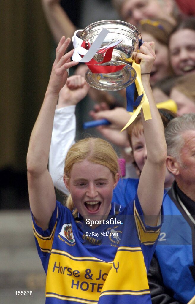 19 September 2004; Tipperary captain Joanne Ryan lifts the O'Duffy Cup. Foras na Gaeilge Senior Camogie Championship All-Ireland Final, Tipperary v Cork, Croke Park, Dublin. Picture credit; Ray McManus / SPORTSFILE