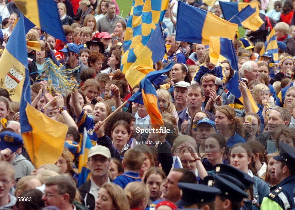 19 September 2004; Tipperary fans celebrate after victory over Cork. Foras na Gaeilge Senior Camogie Championship All-Ireland Final, Tipperary v Cork, Croke Park, Dublin. Picture credit; Pat Murphy / SPORTSFILE