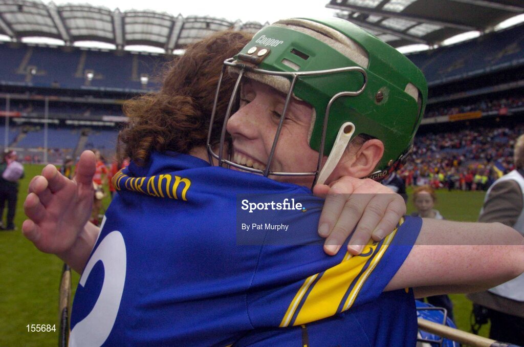 19 September 2004; Tipperary's Eimear McDonnell, left, and Claire Grogan celebrate victory over Cork. Foras na Gaeilge Senior Camogie Championship All-Ireland Final, Tipperary v Cork, Croke Park, Dublin. Picture credit; Pat Murphy / SPORTSFILE