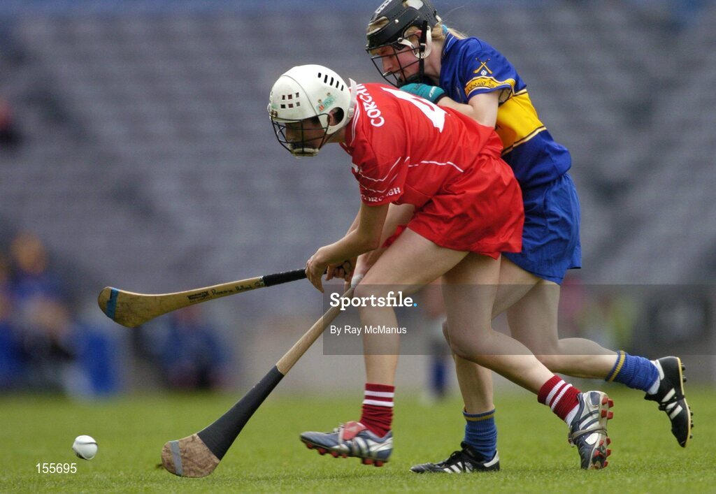 19 September 2004; Rosarie Holland, Cork, in action against Joanne Ryan, Tipperary. Foras na Gaeilge Senior Camogie Championship All-Ireland Final, Tipperary v Cork, Croke Park, Dublin. Picture credit; Ray McManus / SPORTSFILE