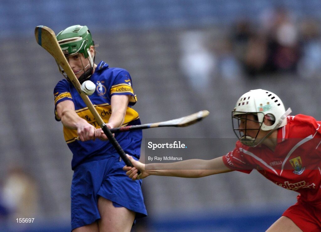 19 September 2004; Eimear McDonnell, Tipperary, in action against Rosarie Holland, Cork. Foras na Gaeilge Senior Camogie Championship All-Ireland Final, Tipperary v Cork, Croke Park, Dublin. Picture credit; Ray McManus / SPORTSFILE