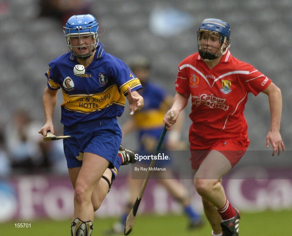 19 September 2004; Angie McDermott, Tipperary, in action against Emer Dillon, Cork. Foras na Gaeilge Senior Camogie Championship All-Ireland Final, Tipperary v Cork, Croke Park, Dublin. Picture credit; Ray McManus / SPORTSFILE