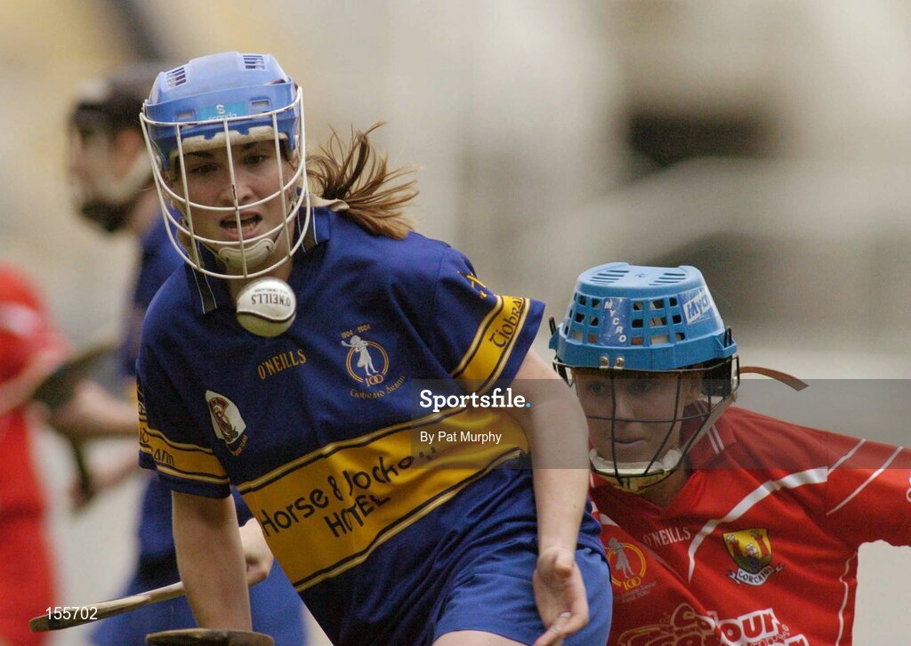 19 September 2004; Philly Fogarty, Tipperary, in action against Vivienne Harris, Cork. Foras na Gaeilge Senior Camogie Championship All-Ireland Final, Tipperary v Cork, Croke Park, Dublin. Picture credit; Pat Murphy / SPORTSFILE