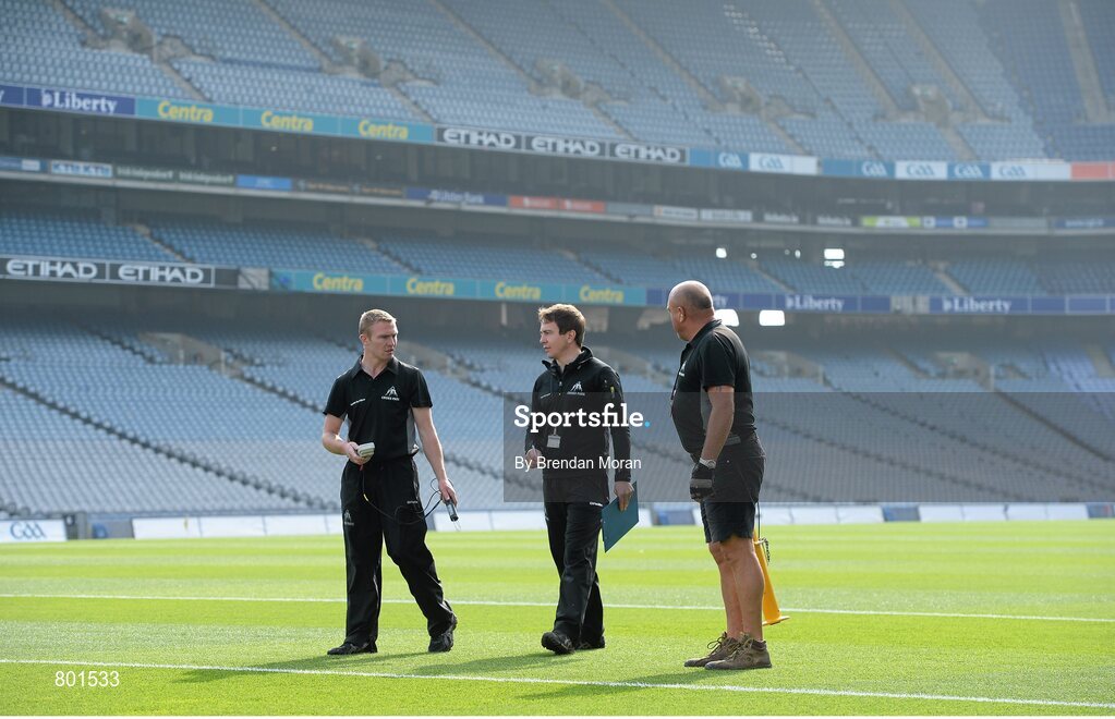 28 September 2013; Croke Park pitch manager Stuart Wilson, centre, and groundsmen Padhraic Greene, left, and Marcel Bentea prepare the pitch before the day's matches. GAA Hurling All-Ireland Senior Championship Final Replay, Cork v Clare, Croke Park, Dublin. Picture credit: Brendan Moran / SPORTSFILE