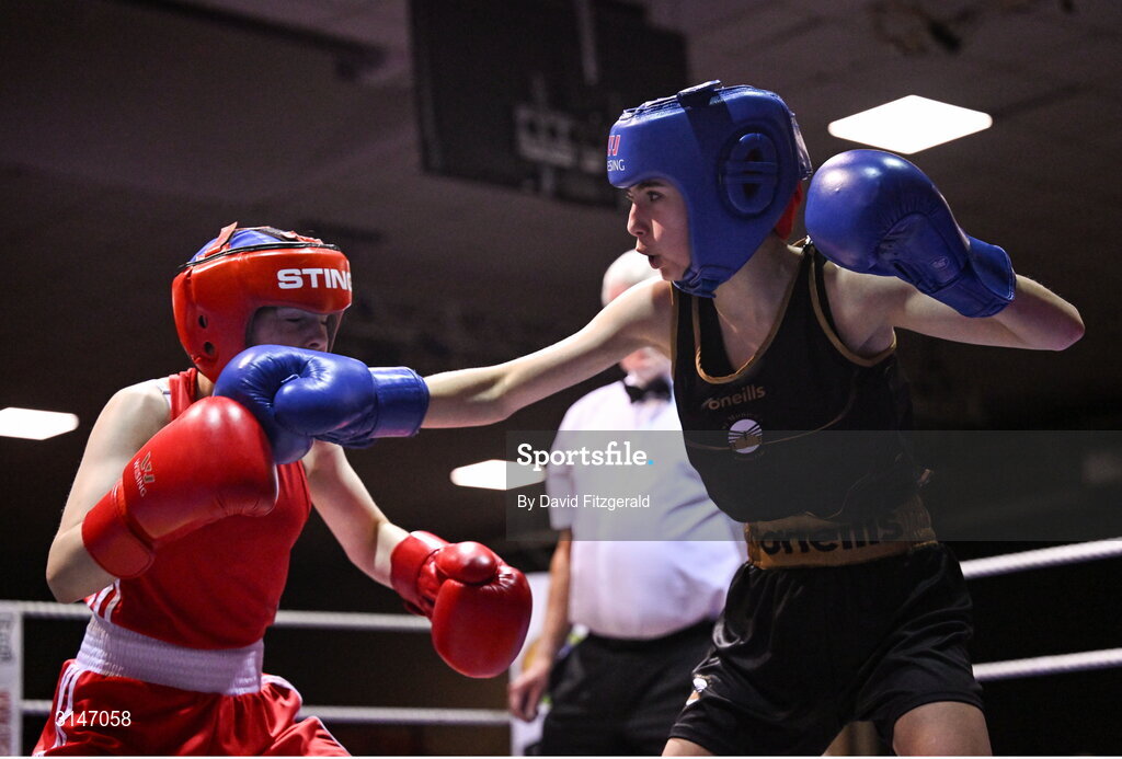 30 May 2025; Kayla Harris of St Monica's BC, right, in action against Danielle Smithers of Swords BC during their bout at the 2025 National Senior Cadet Championship Finals at the National Boxing Stadium in Dublin. Photo by David Fitzgerald/Sportsfile