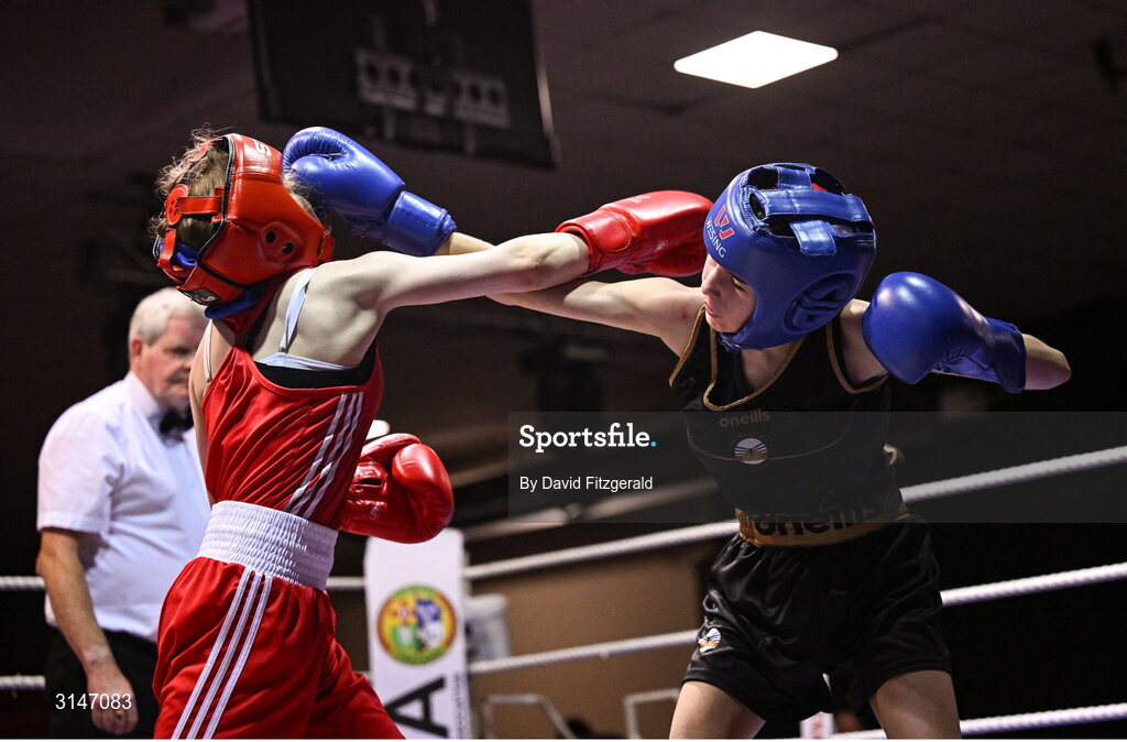 30 May 2025; Kayla Harris of St Monica's BC, right, in action against Danielle Smithers of Swords BC during their bout at the 2025 National Senior Cadet Championship Finals at the National Boxing Stadium in Dublin. Photo by David Fitzgerald/Sportsfile