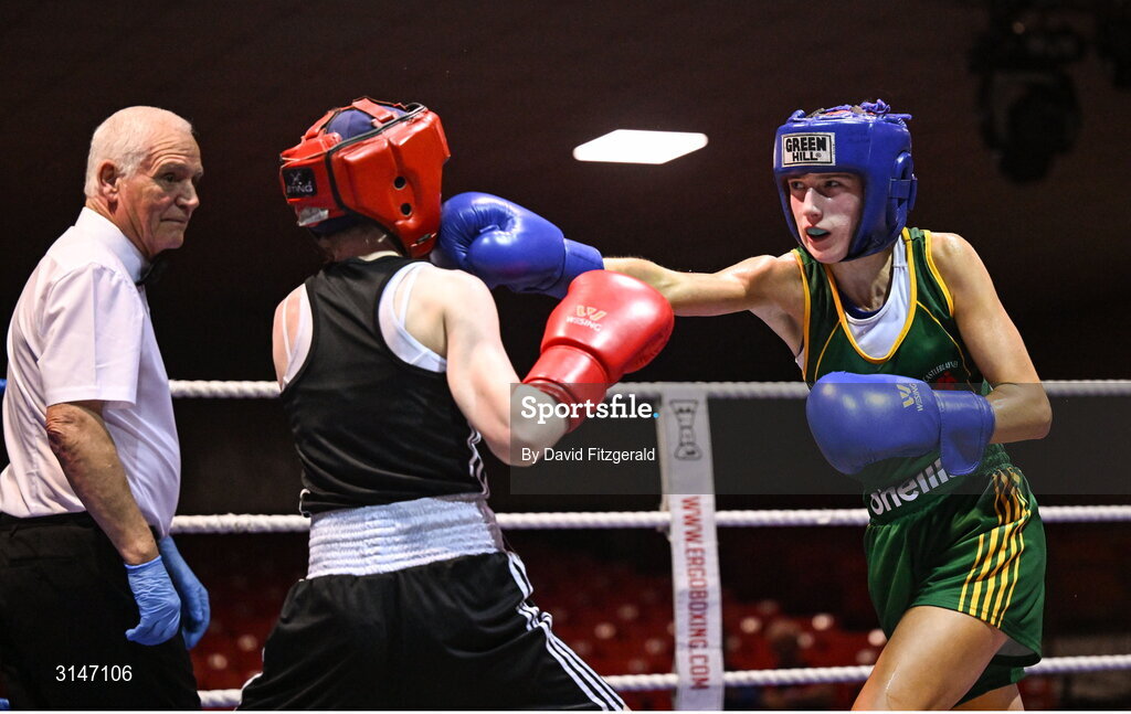 30 May 2025; Kaiden McKenna of Castleblayney BC, right, in action against Heidi Carolan of East Meath BC during their bout at the 2025 National Senior Cadet Championship Finals at the National Boxing Stadium in Dublin. Photo by David Fitzgerald/Sportsfile