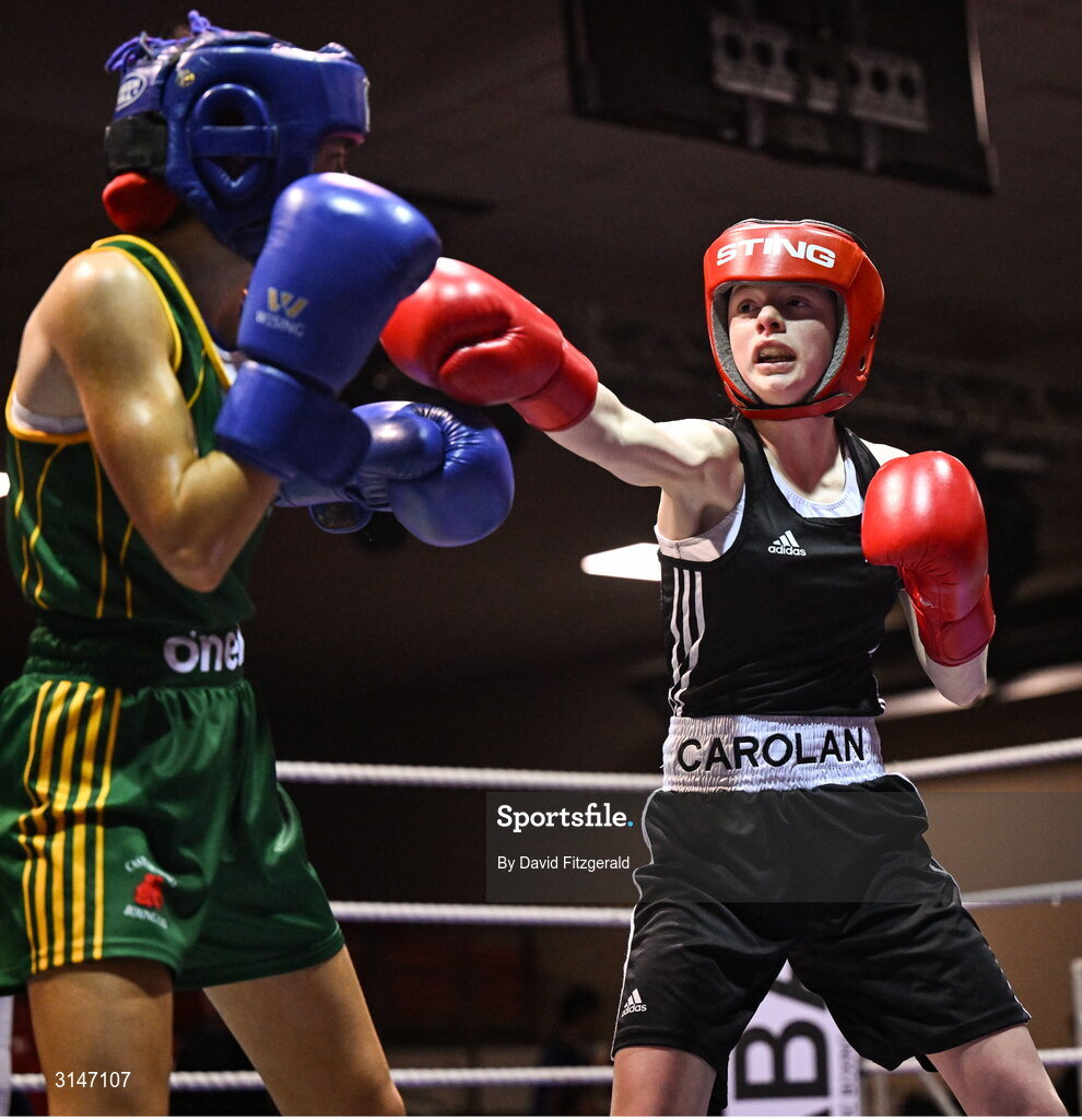 30 May 2025; Heidi Carolan of East Meath BC, right, in action against Kaiden McKenna of Castleblayney BC during their bout at the 2025 National Senior Cadet Championship Finals at the National Boxing Stadium in Dublin. Photo by David Fitzgerald/Sportsfile