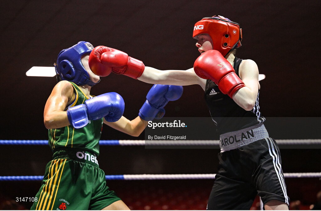 30 May 2025; Heidi Carolan of East Meath BC, right, in action against Kaiden McKenna of Castleblayney BC during their bout at the 2025 National Senior Cadet Championship Finals at the National Boxing Stadium in Dublin. Photo by David Fitzgerald/Sportsfile