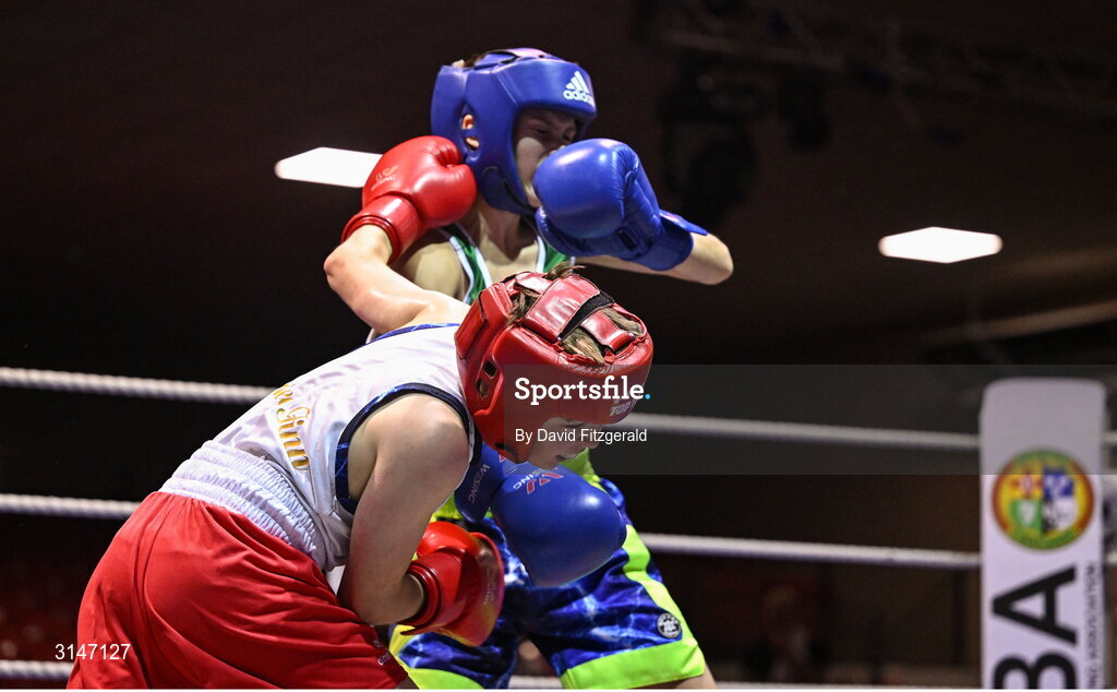 30 May 2025; Rylee Finn of St Nicholas BC in action against Pat Stokes of Olympic BC during their bout at the 2025 National Senior Cadet Championship Finals at the National Boxing Stadium in Dublin. Photo by David Fitzgerald/Sportsfile