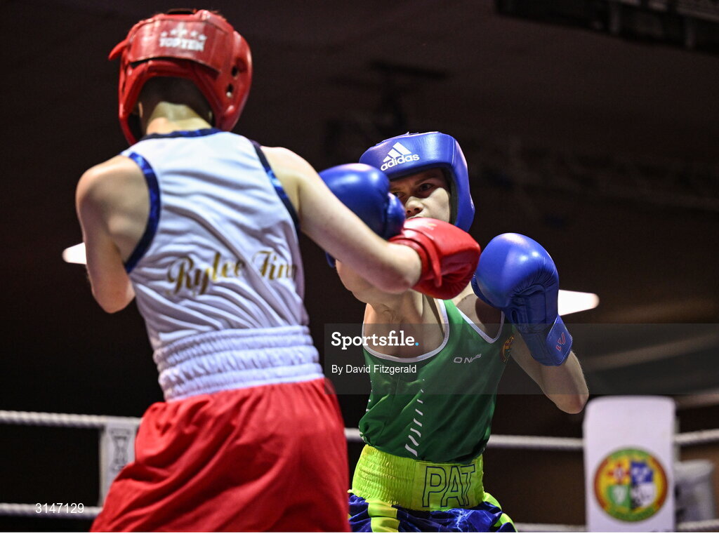 30 May 2025; Pat Stokes of Olympic BC, right, in action against Rylee Finn of St Nicholas BC during their bout at the 2025 National Senior Cadet Championship Finals at the National Boxing Stadium in Dublin. Photo by David Fitzgerald/Sportsfile