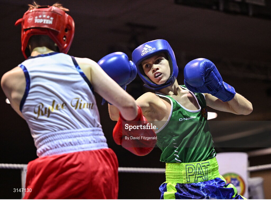 30 May 2025; Pat Stokes of Olympic BC, right, in action against Rylee Finn of St Nicholas BC during their bout at the 2025 National Senior Cadet Championship Finals at the National Boxing Stadium in Dublin. Photo by David Fitzgerald/Sportsfile