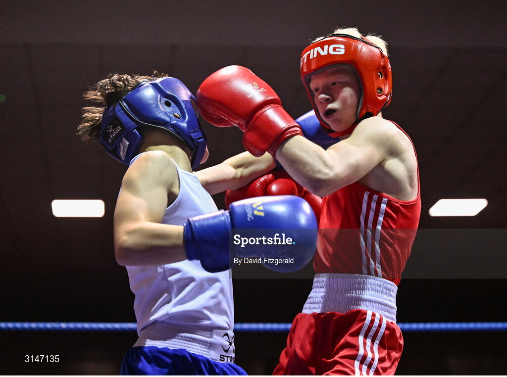 30 May 2025; Joshua Cairns of Oakleaf BC, right, in action against Zack Kenny of Elite M BC during their bout at the 2025 National Senior Cadet Championship Finals at the National Boxing Stadium in Dublin. Photo by David Fitzgerald/Sportsfile