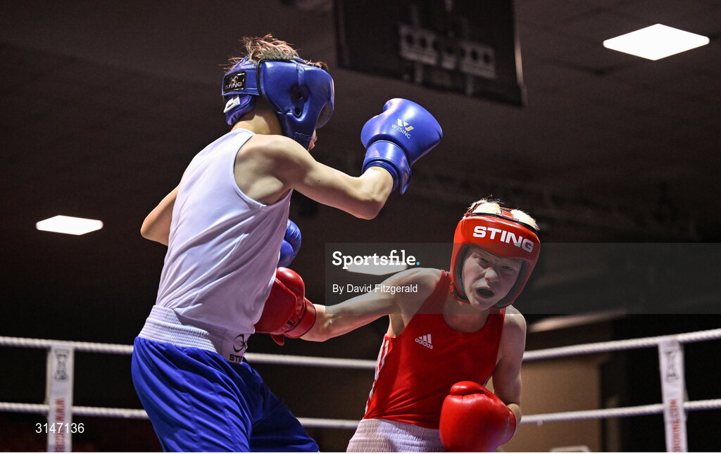 30 May 2025; Joshua Cairns of Oakleaf BC, right, in action against Zack Kenny of Elite M BC during their bout at the 2025 National Senior Cadet Championship Finals at the National Boxing Stadium in Dublin. Photo by David Fitzgerald/Sportsfile