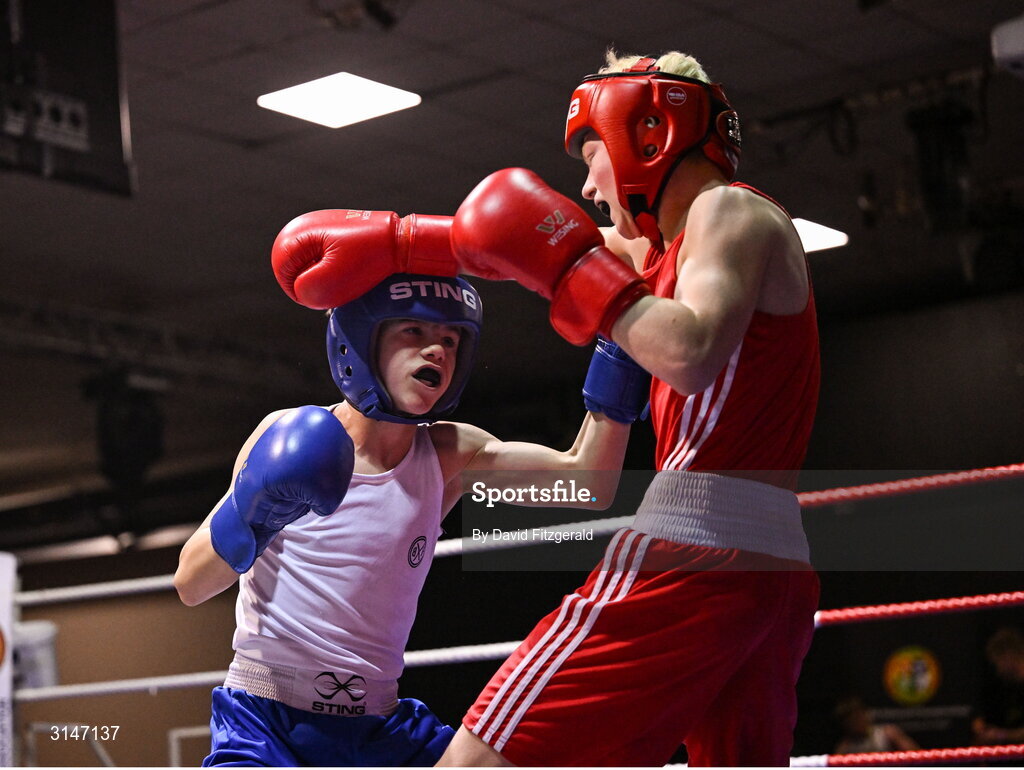 30 May 2025; Zack Kenny of Elite M BC, left, in action against Joshua Cairns of Oakleaf BC during their bout at the 2025 National Senior Cadet Championship Finals at the National Boxing Stadium in Dublin. Photo by David Fitzgerald/Sportsfile
