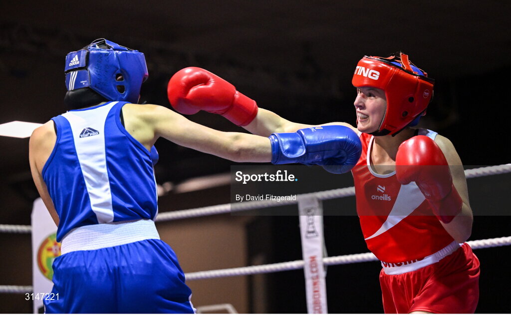 30 May 2025; Abby Murray of Muskerry BC, right, in action against Evelyn Spicer of Enniskerry BC during their bout at the 2025 National Senior Cadet Championship Finals at the National Boxing Stadium in Dublin. Photo by David Fitzgerald/Sportsfile