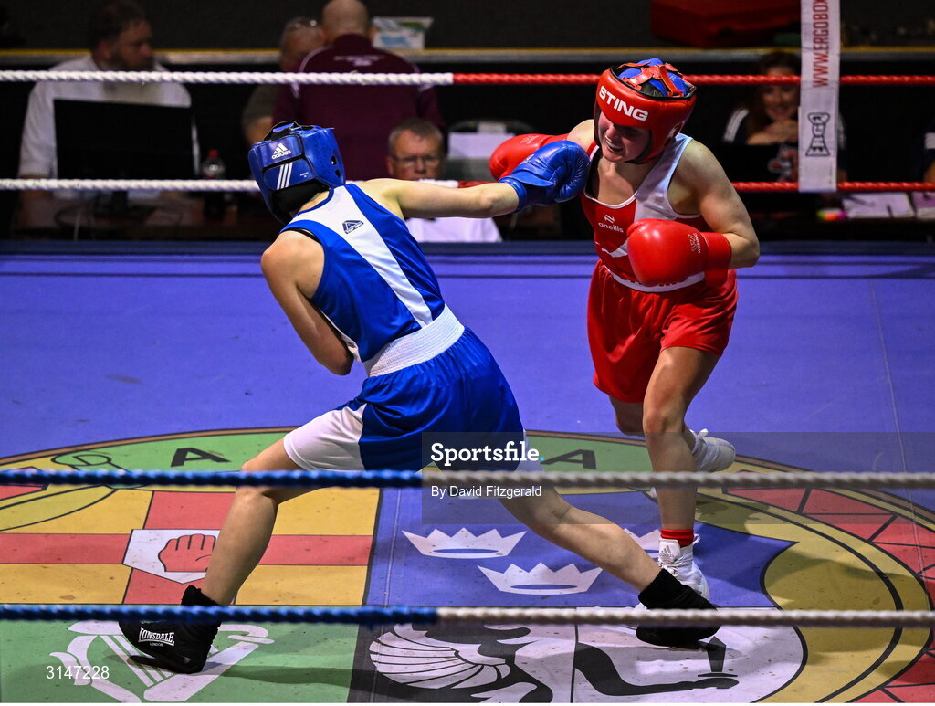 30 May 2025; Abby Murray of Muskerry BC, right, in action against Evelyn Spicer of Enniskerry BC during their bout at the 2025 National Senior Cadet Championship Finals at the National Boxing Stadium in Dublin. Photo by David Fitzgerald/Sportsfile