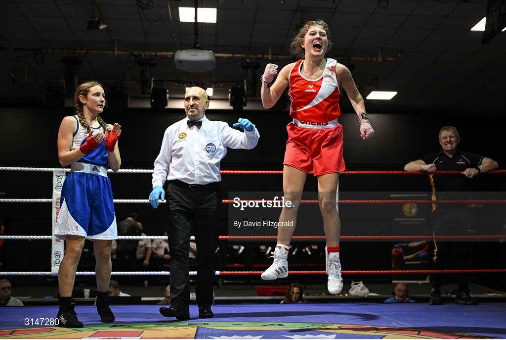 30 May 2025; Abby Murray of Muskerry BC, right, celebrates after winning their bout against Evelyn Spicer of Enniskerry BC during their bout at the 2025 National Senior Cadet Championship Finals at the National Boxing Stadium in Dublin. Photo by David Fitzgerald/Sportsfile